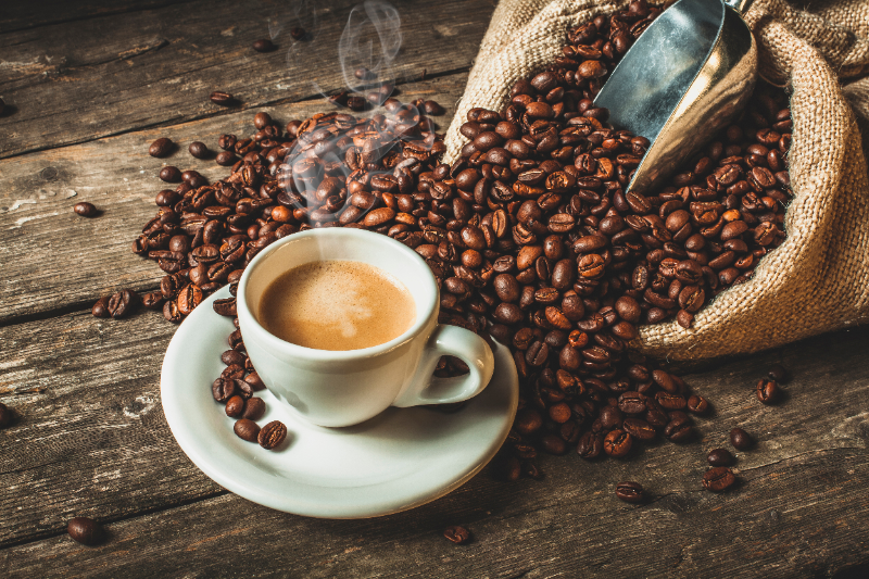 Coffee cup and bag of beans